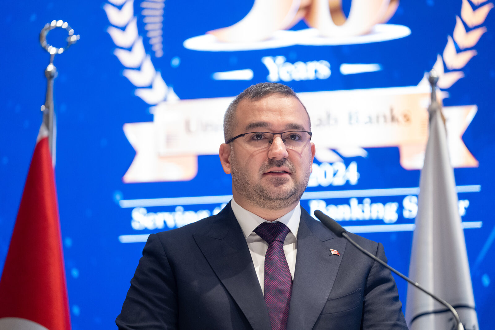 Governor of the Central Bank of the Republic of Türkiye (CBRT), Fatih Karahan, delivers a speech at the International Arab Banking Summit in Istanbul, Türkiye, on May 24, 2024. (AA Photo)