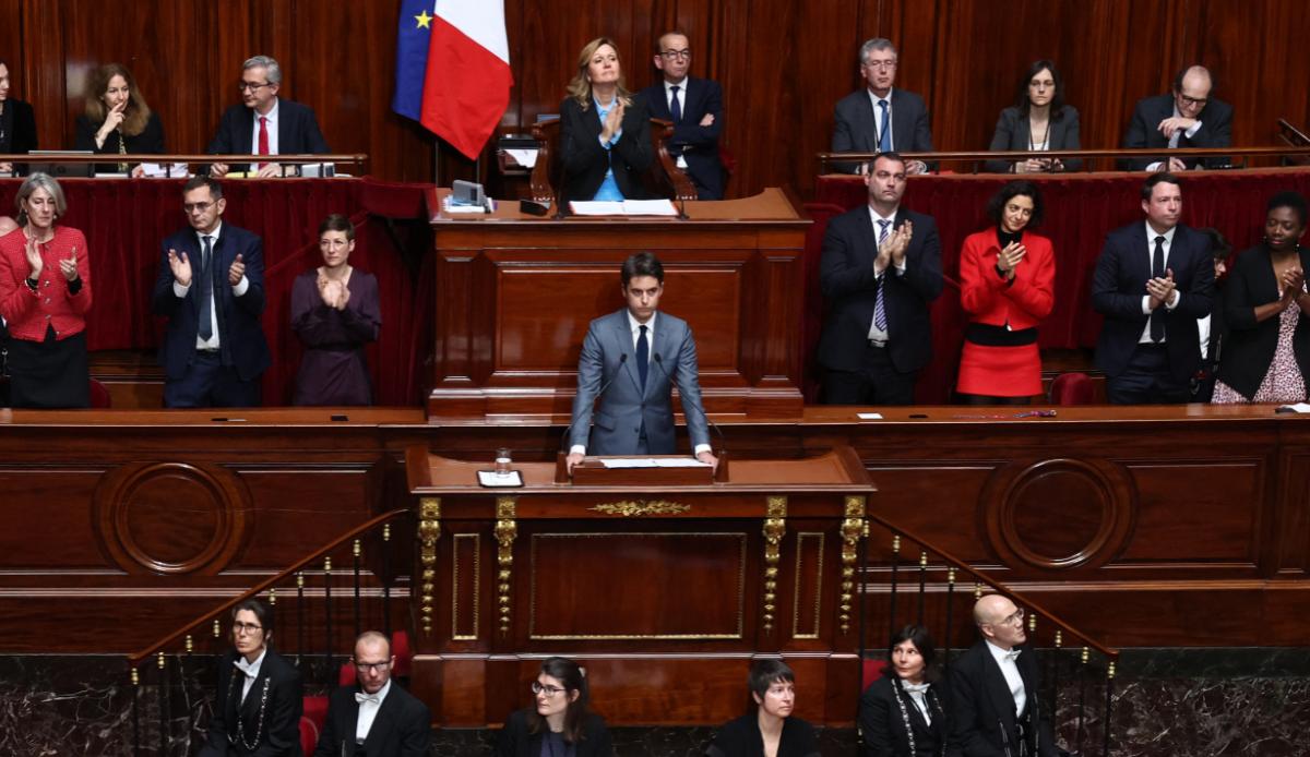 France's prime minister warns of global threat to abortion rights