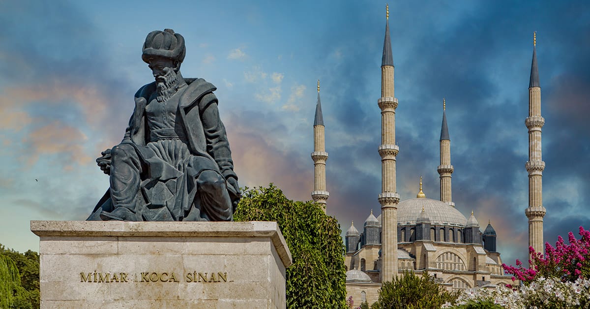 A commemorative statue of the Ottoman architect Mimar Sinan stands before Selimiye Mosque which many scholars consider his finest work, in Edirne, Türkiye, July 17, 2017. (AA Photo)