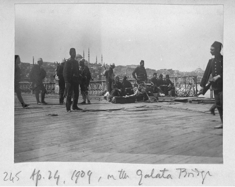 Young Turk soldiers and cannon on Galata bridge, in Istanbul, Türkiye, April 24, 1909 (Photo via Gertrude Bell)