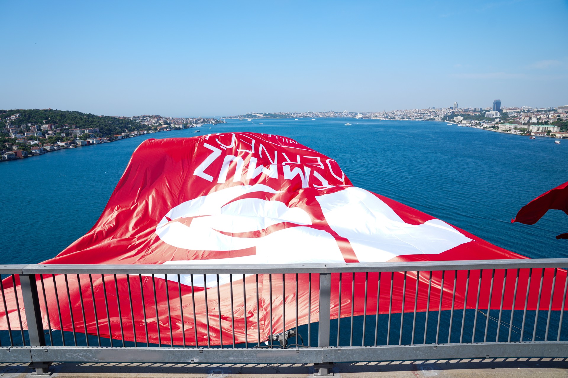 Turkish flags unfurl on Istanbul bridges to honor July 15 coup attempt victims