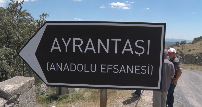 Sign referring to the legend of 'Kirmizi Ebe' or 'Ayran Tasi', July 20, 2024, Ankara, Türkiye. (AA Photo)