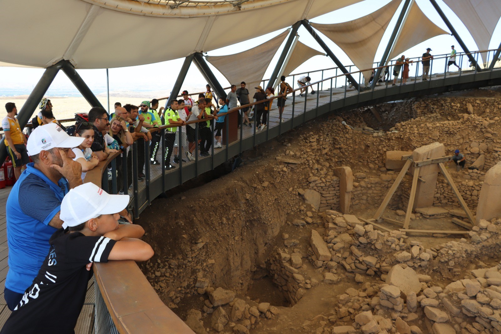 Bicycle enthusiasts at Gobeklitepe on the 10th anniversary of the death of Professor Klaus Schmidt, who unearthed Göbeklitepe, a UNESCO World Heritage Site, Sanliurfa, Türkiye, July 28, 2024 (IHA Photo) 