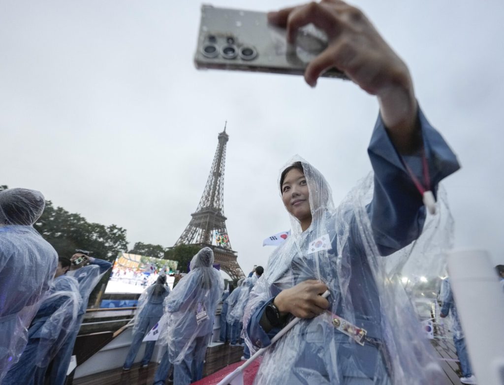 The South Korean delegation on a boat on the Seine River before the French-speaking presenter introduced them using the official name for North Korea, Paris, France July 27, 2024. (AFP)