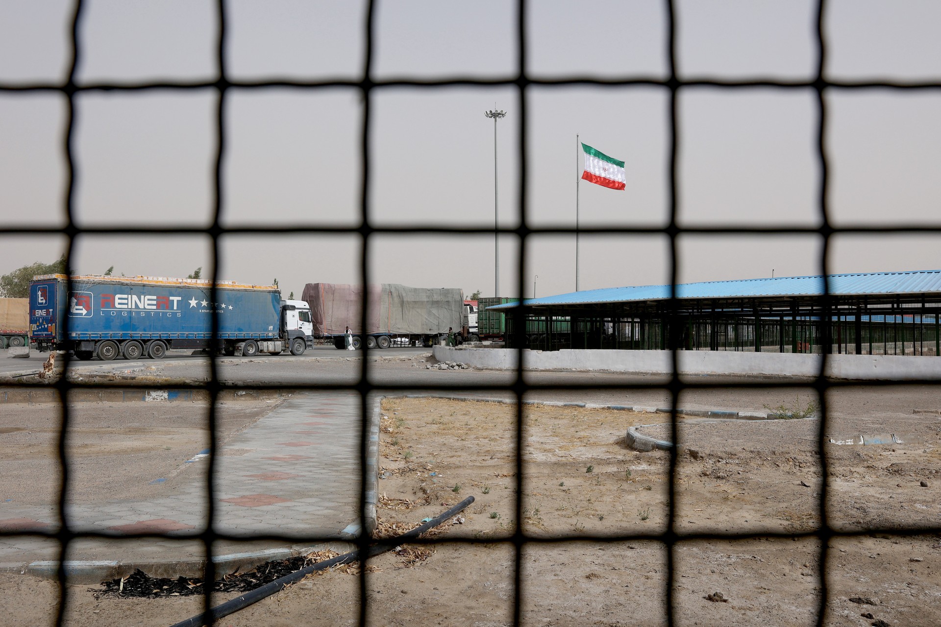Iran's flag is pictured at the Milak border crossing between Iran and Afghanistan, Sistan and Baluchestan Province, Iran September 8, 2021. (Reuters)