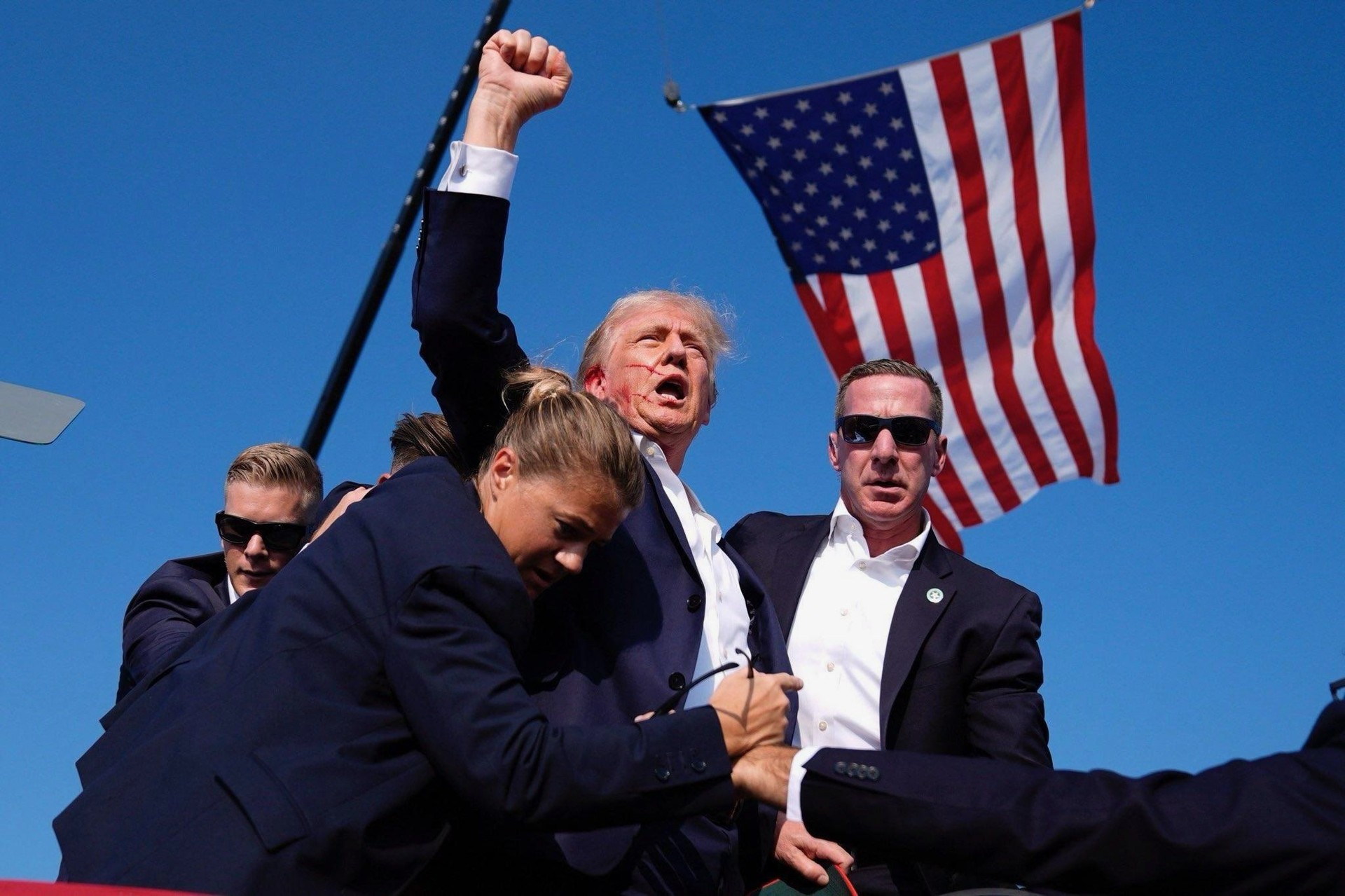 Donald Trump shot in ear during  assassination attempt on live broadcast