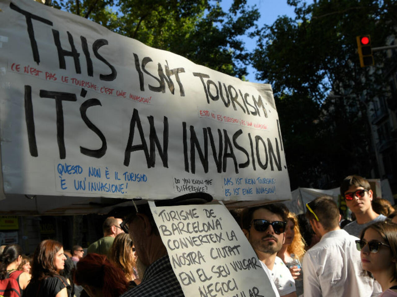 Protesters at a demonstration in Barcelona on June 10, 2017 against what they claim is a lack of control by the city's tourism management (AFP Photo)
