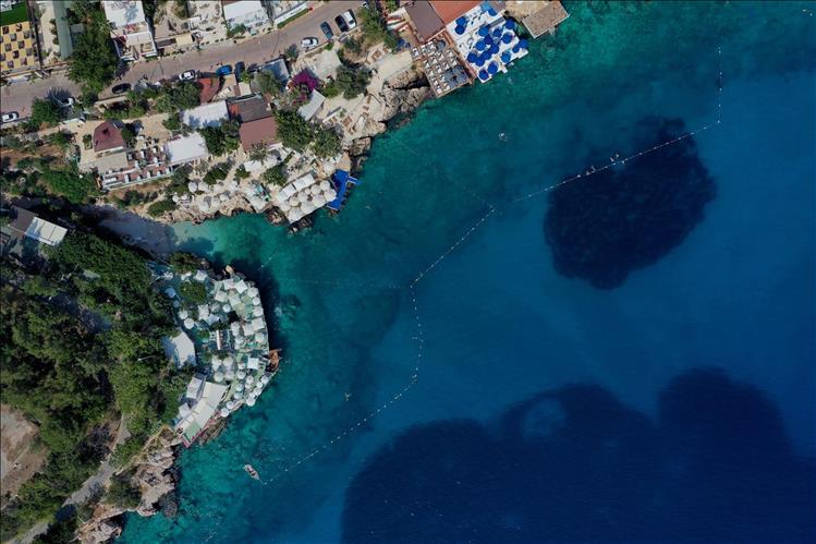 Kucuk Cakil Beach in Kas offers a cozy, pebbled haven with crystal-clear waters, Türkiye, August 2024. (Photo Kas Municipality)