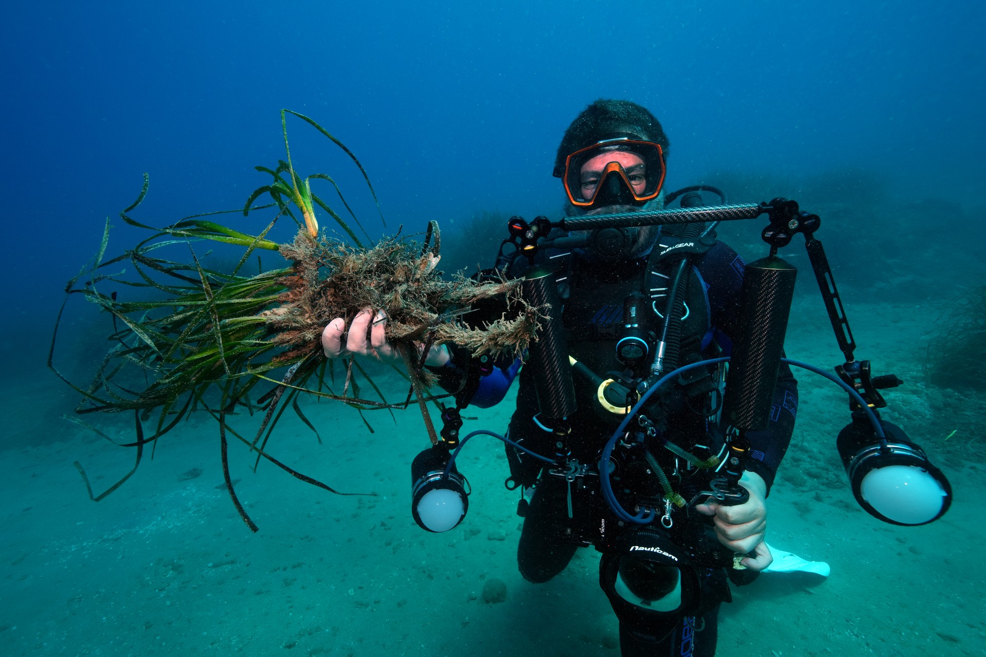 Moments when anchors thrown from excursion boats in Antalya damaged the posidonia meadows (seagrass) known as the “lungs of the Mediterranean” were captured underwater, Underwater documentary maker and cinematographer Tahsin Ceylan (In photo), Alanya, Antalya, Türkiye, August 14, 2024 (AA Photo)