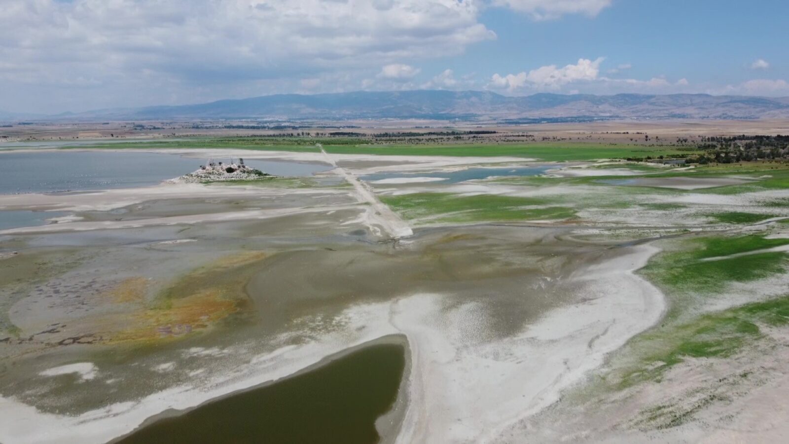 Meters of water have receded in Yedikir Dam Lake in Amasya due to drought and irrigation needs, Türkiye, July 25, 2024 (IHA Photo)