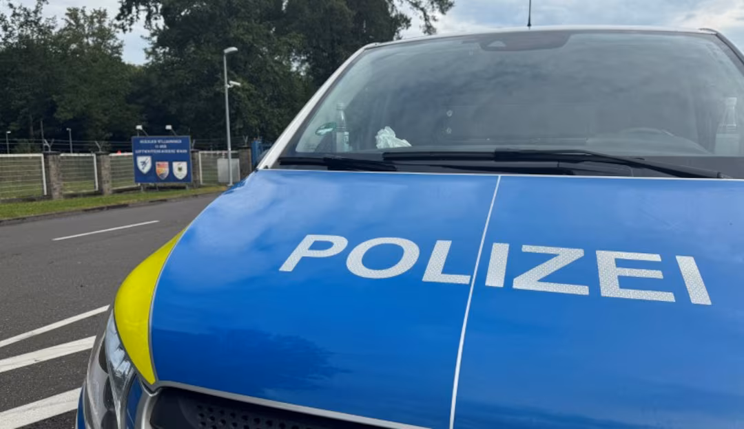 A police car blocks the entrance to the German Air Force Base of Cologne-Wahn, next to Cologne Bonn Airport. (Reuters Photo)