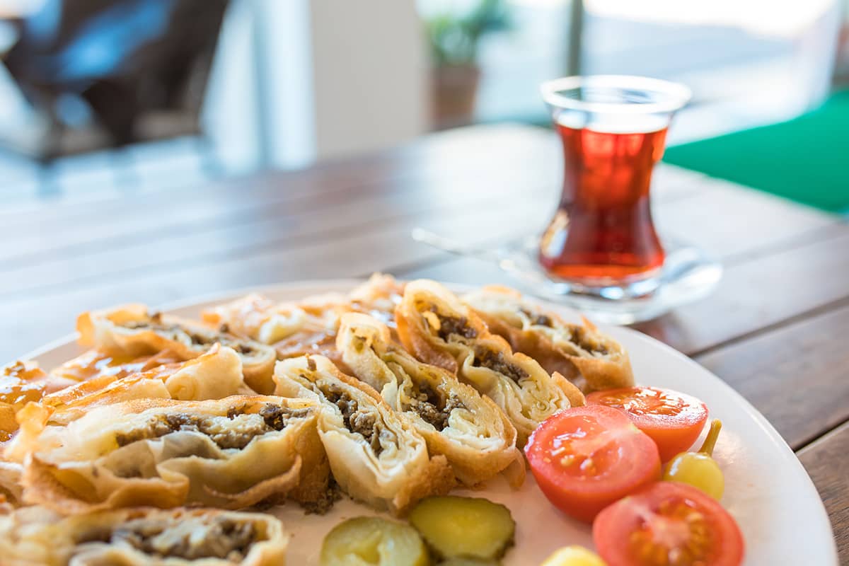 Indulge in the flaky, savory perfection of Turkish börek, a street food classic. September, 2024. (Photo goturkiye)