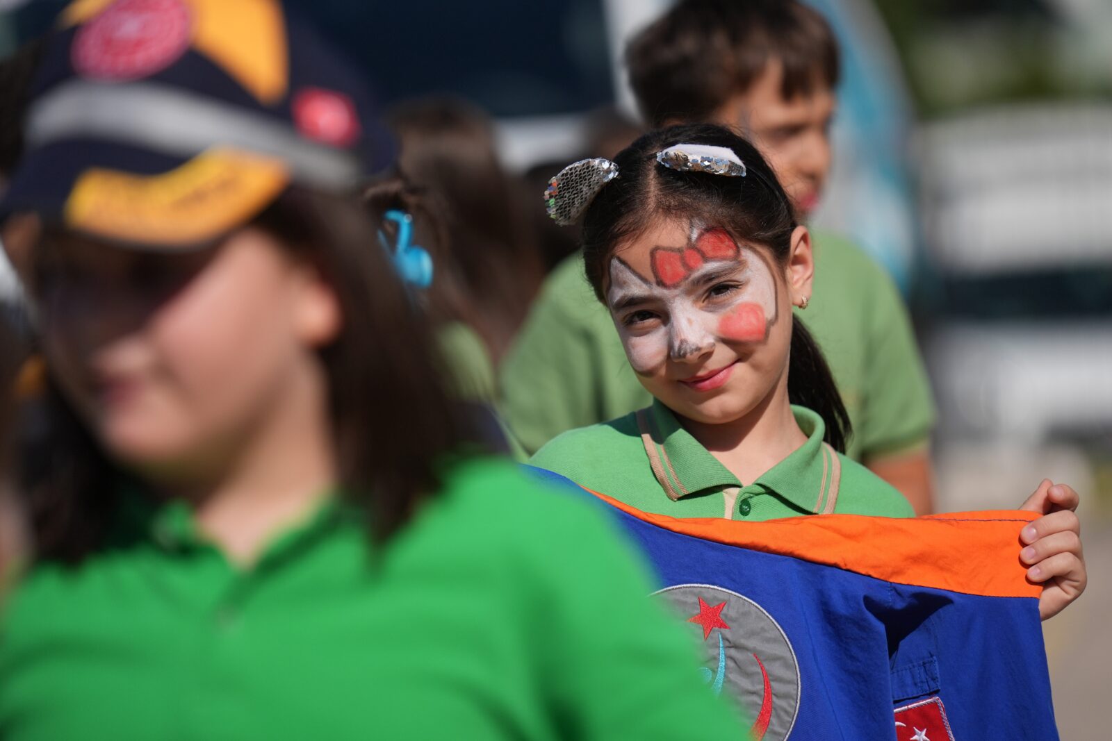 Through a project implemented in Düzce, students in rural schools are being introduced to theater, with a child smiling as they watch a scene from the play, Türkiye, Sept. 27, 2024. (AA Photo)