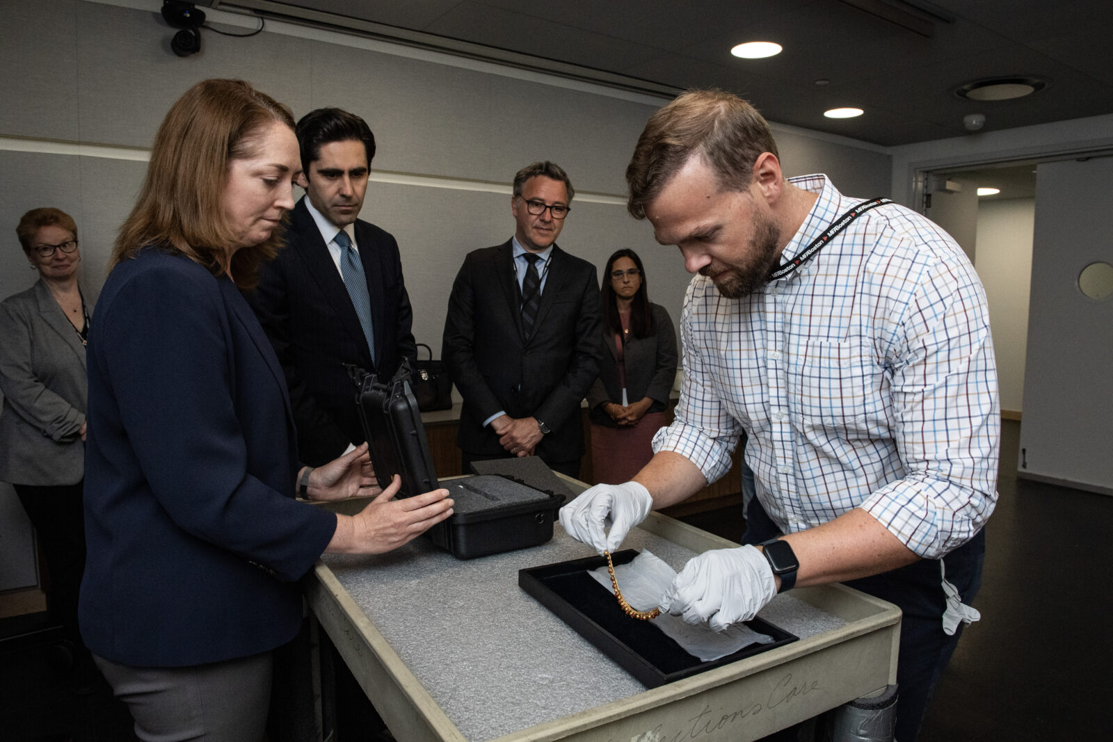 Officials of the Boston Museum of Fine Arts hand over the 2,700-year-old gold necklace to Turkish authorities at an official ceremony held at the Turkish Consulate General In Boston, United States, September 3, 2024 (AA Photo)