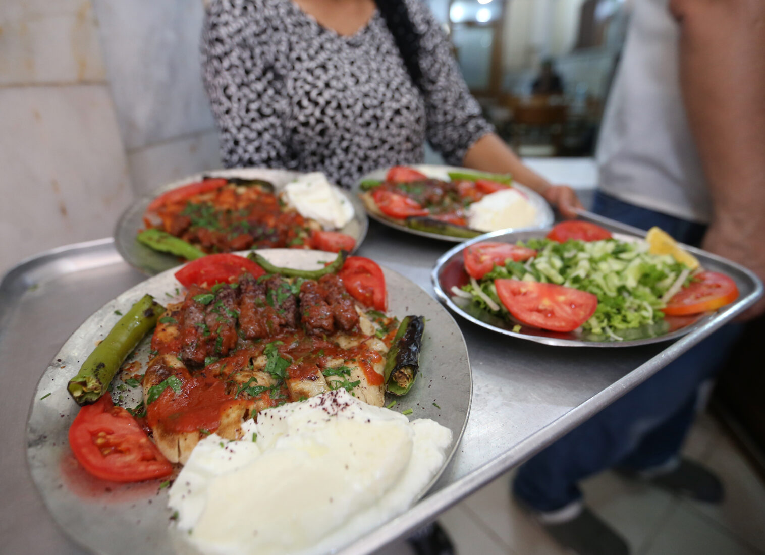 Onayli family living in Manisa continues to serve Manisa kebab, which has become synonymous with the city, to customers in the restaurant where his grandfather first started serving in 1927, Türkiye September 9, 2024 (<a href=