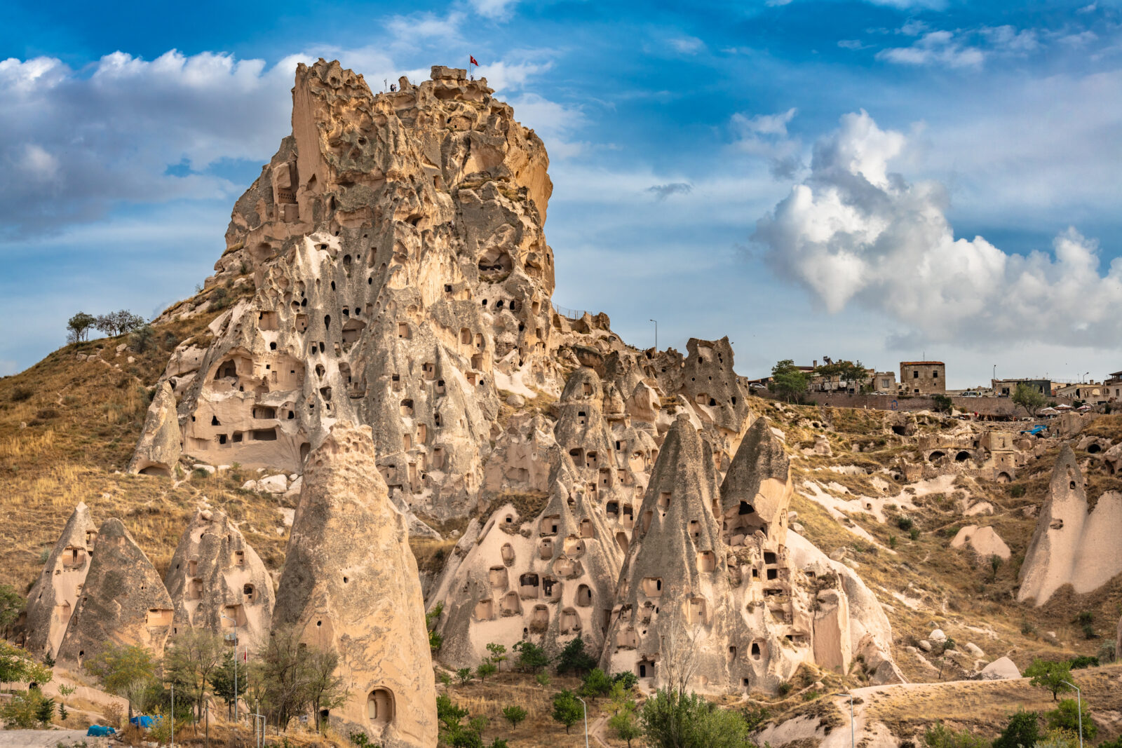 Uchisar natural rock castle and town in Central Anatolia, Türkiye. September, 2024. (Adobe Stock Photo)
