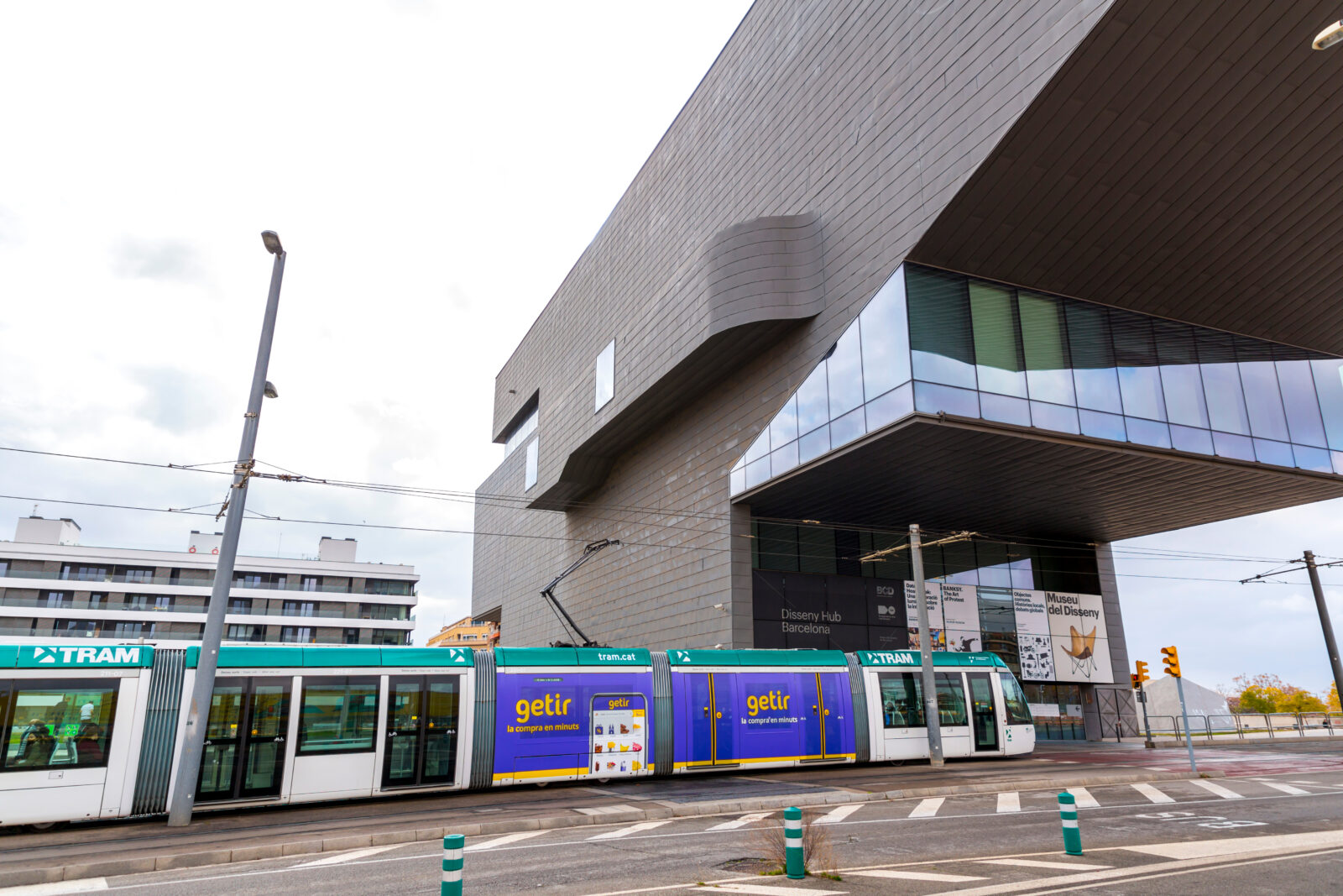 Outdoor advertisement of Turkish company Getir on a public tram in Barcelona, Spain, February 13, 2022. (Adobe Stock Photo)