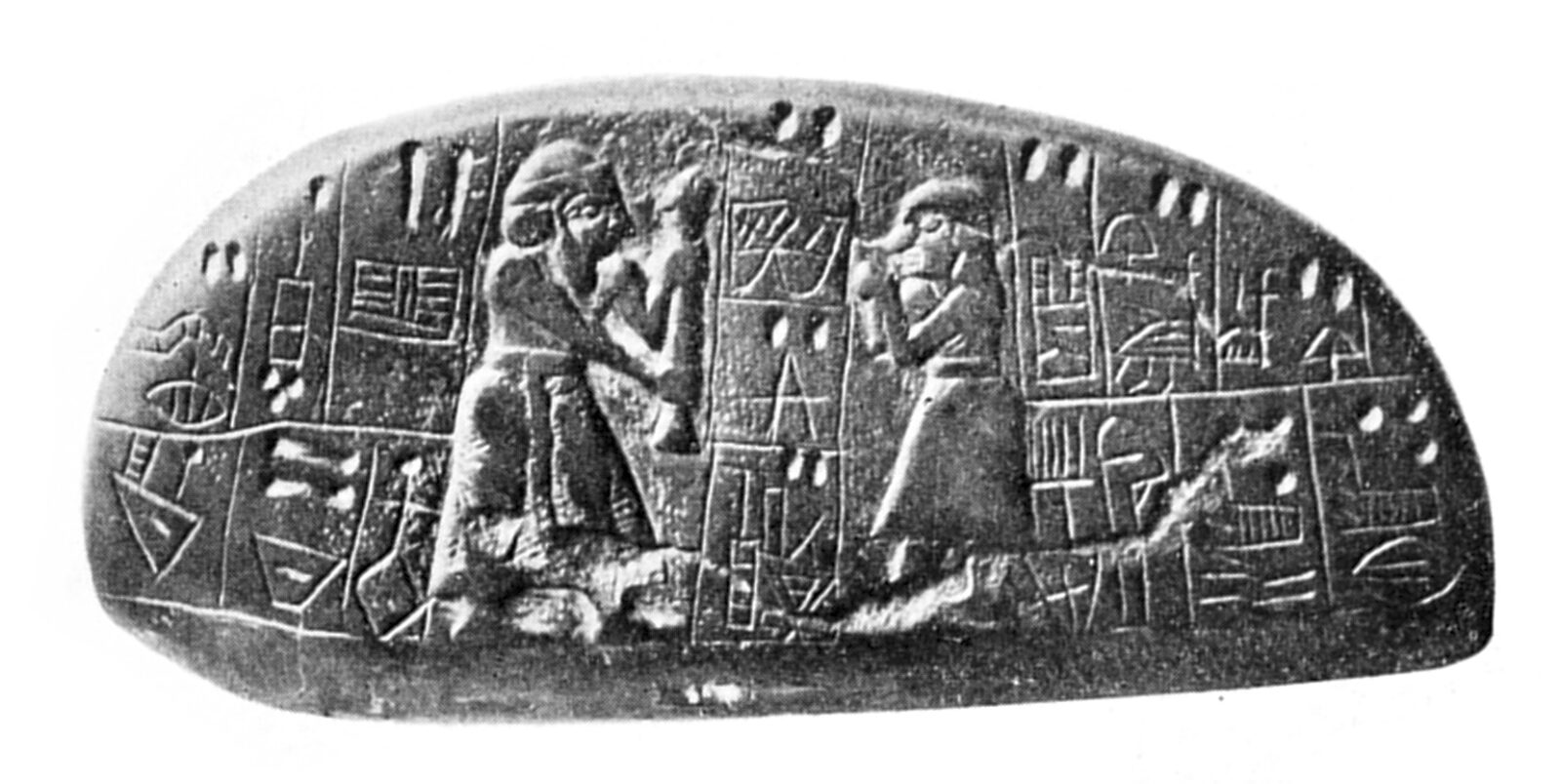The Blau Monuments combine proto-cuneiform characters and illustrations of early Sumerians, Jemdet Nasr period, 3,100–2,700 B.C. (Photo via British Museum)