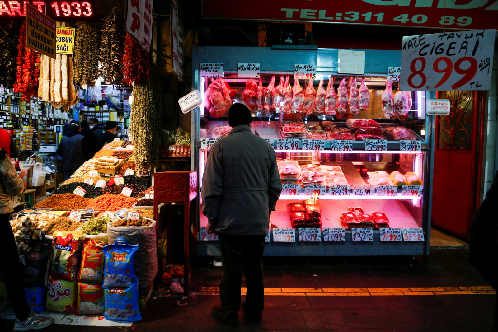 A man looks at a butcher shop window in Ankara, Türkiye February 16, 2022 (Reuters Photo)