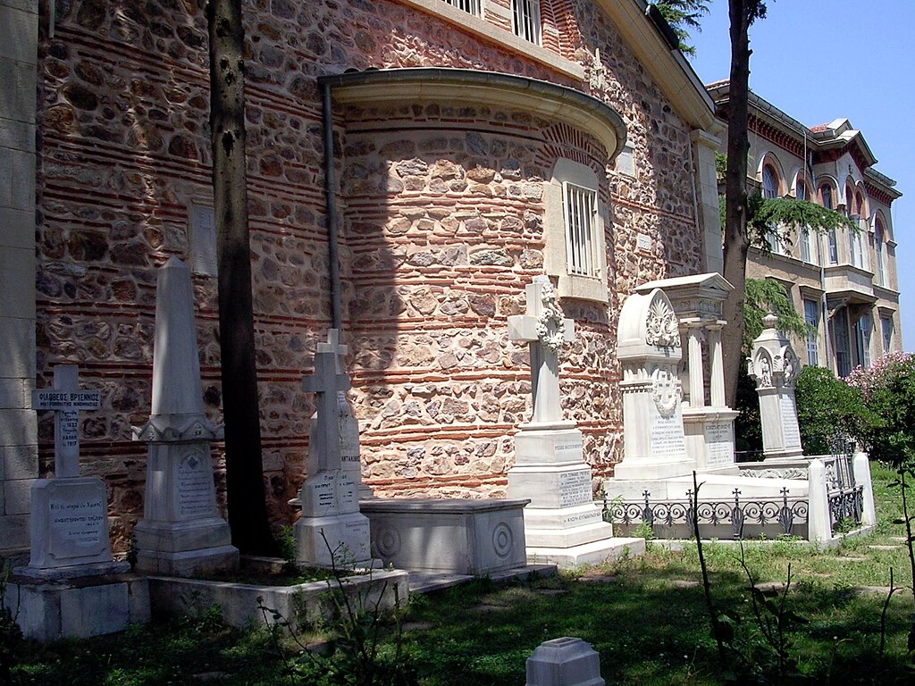 The monastery building and cemeteries adjacent to the school, the main entrance to the seminary beyond the building, Ayatriada Monastery (Halki seminary) in Heybeliada, Türkiye, March, 2009. (Photo via Wikimedia)