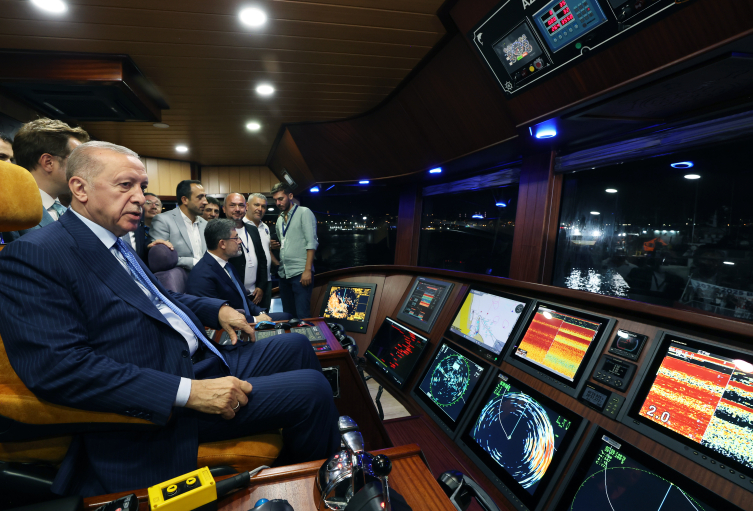 Erdogan and officials in a local fisherman's boat. (Photo via TRT)
