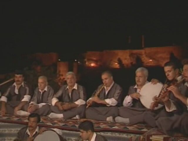 A scene from the music video of the folk song "Nemrudun Kizi" set during an Urfa Sira Gecesi, Urfa, Türkiye, August 22, 2014. (Izlesene Photo)