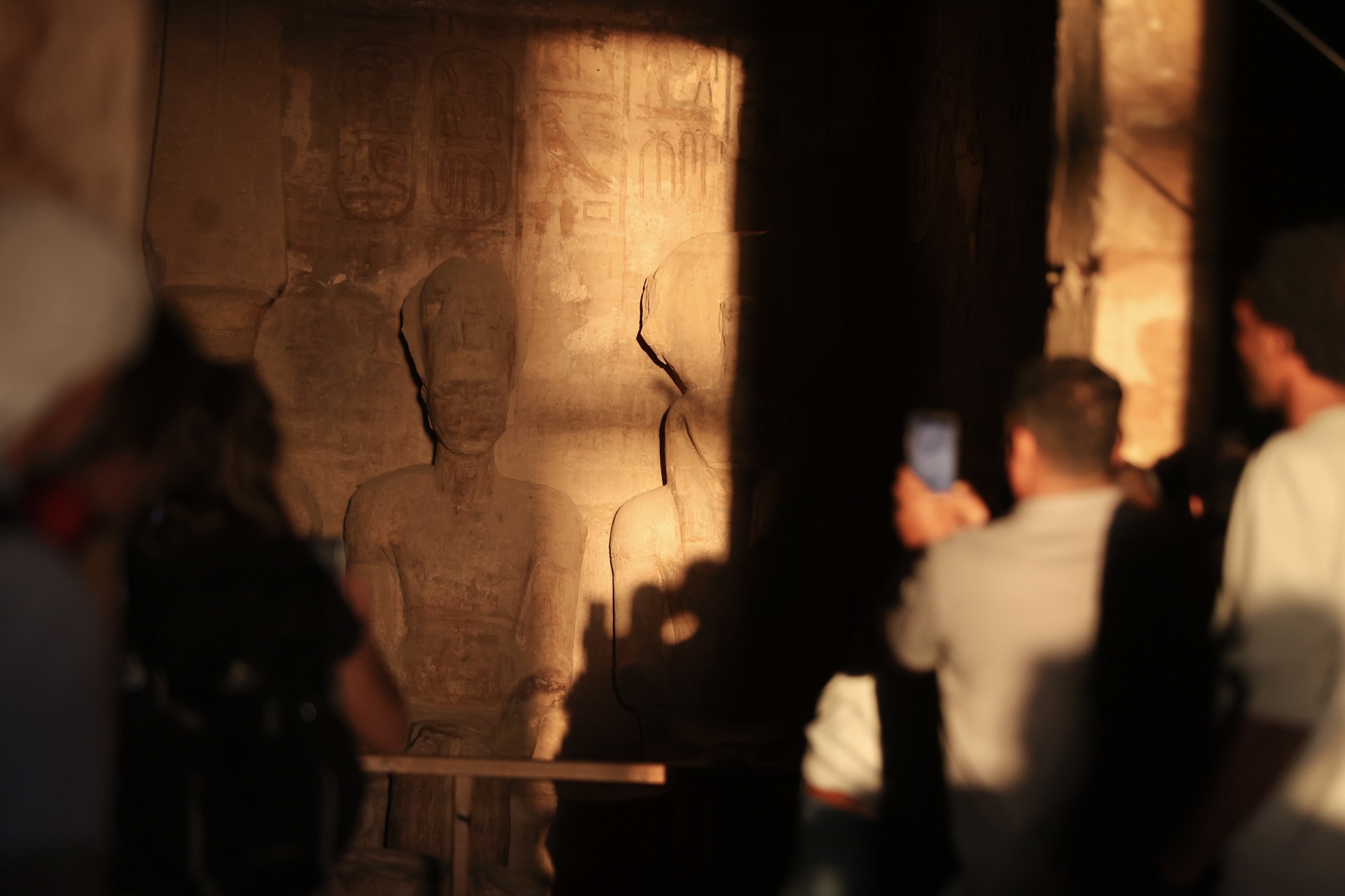 Sun illuminates statue of Pharaoh Ramses II in Egypt during rare celestial event