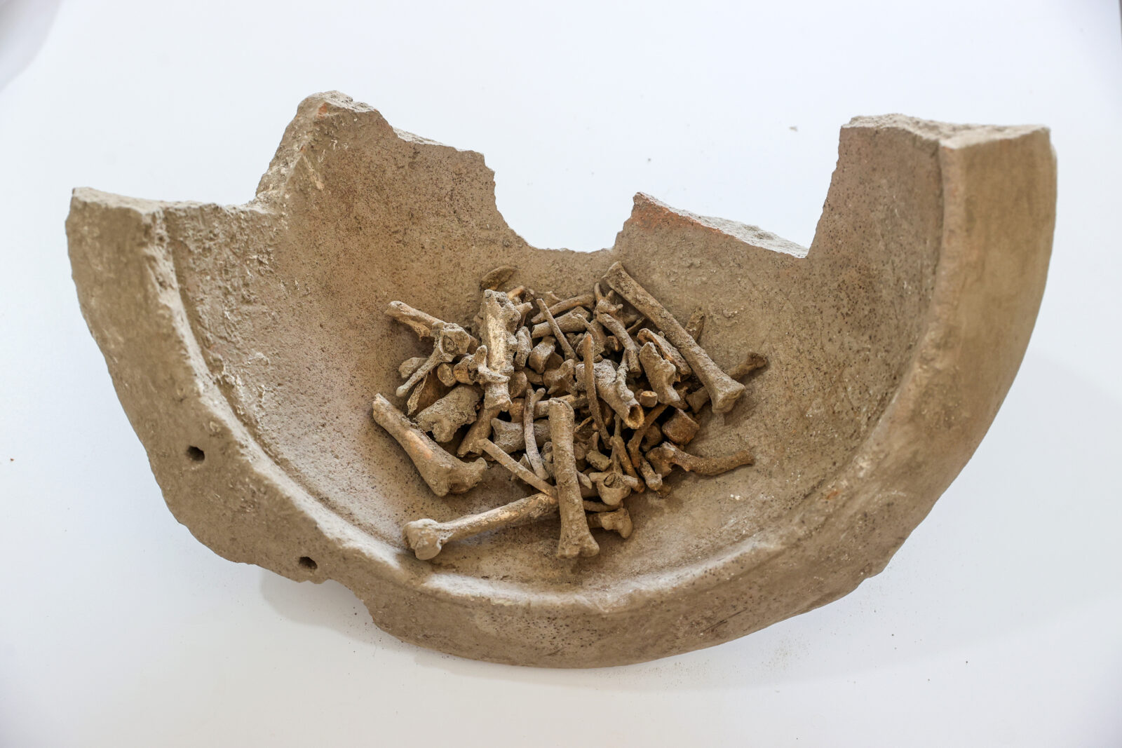 Excavations at the ancient city of Savatra in Konya uncovered infant skeletons inside earthenware vessels, which are now under examination to provide insights into the city's historical way of life in Konya, Türkiye, October 9, 2024 (AA Photo)
