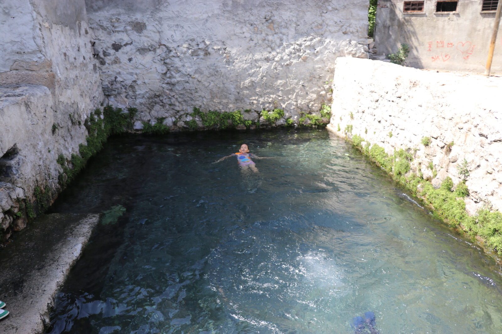 A child swims in an ancient Roman bath built over a thermal spring in the village of Ilisu, located in the Goynucek district of Amasya, Türkiye, Oct. 2, 2024. (AA Photo)
