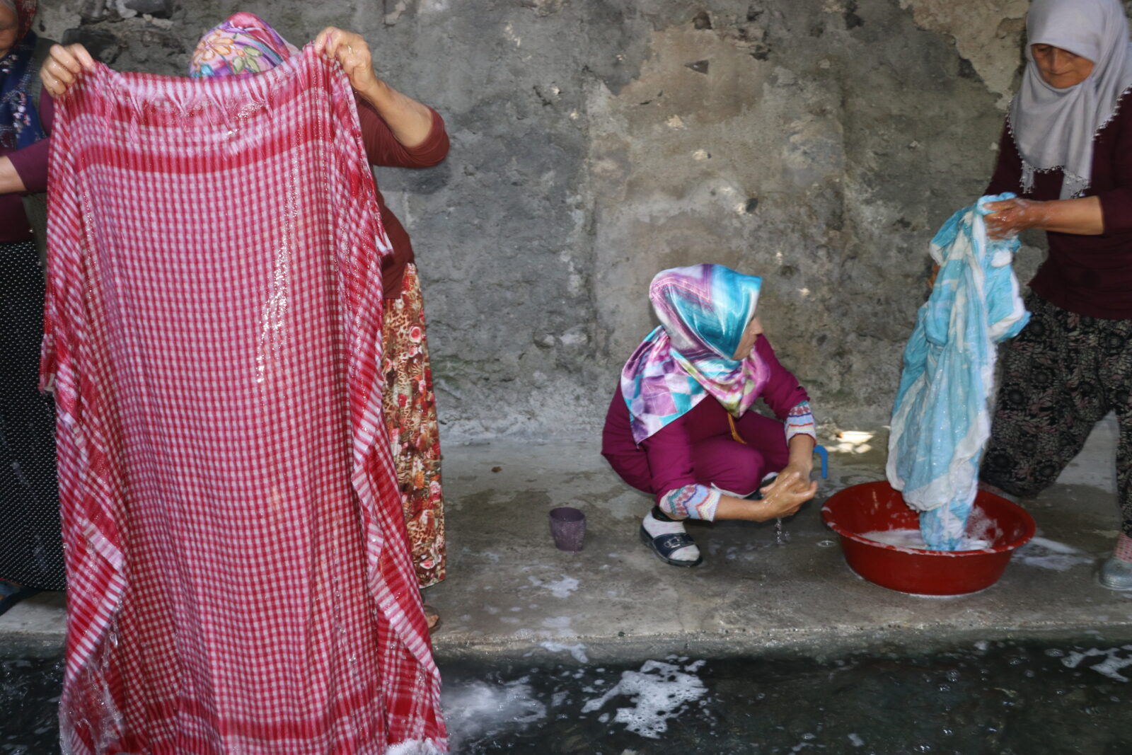 Women continue the tradition of washing laundry every Sunday in an ancient Roman bath built over a thermal spring in the village of Ilisu, located in the Goynucek district of Amasya, Türkiye, Oct. 2, 2024. (AA Photo)