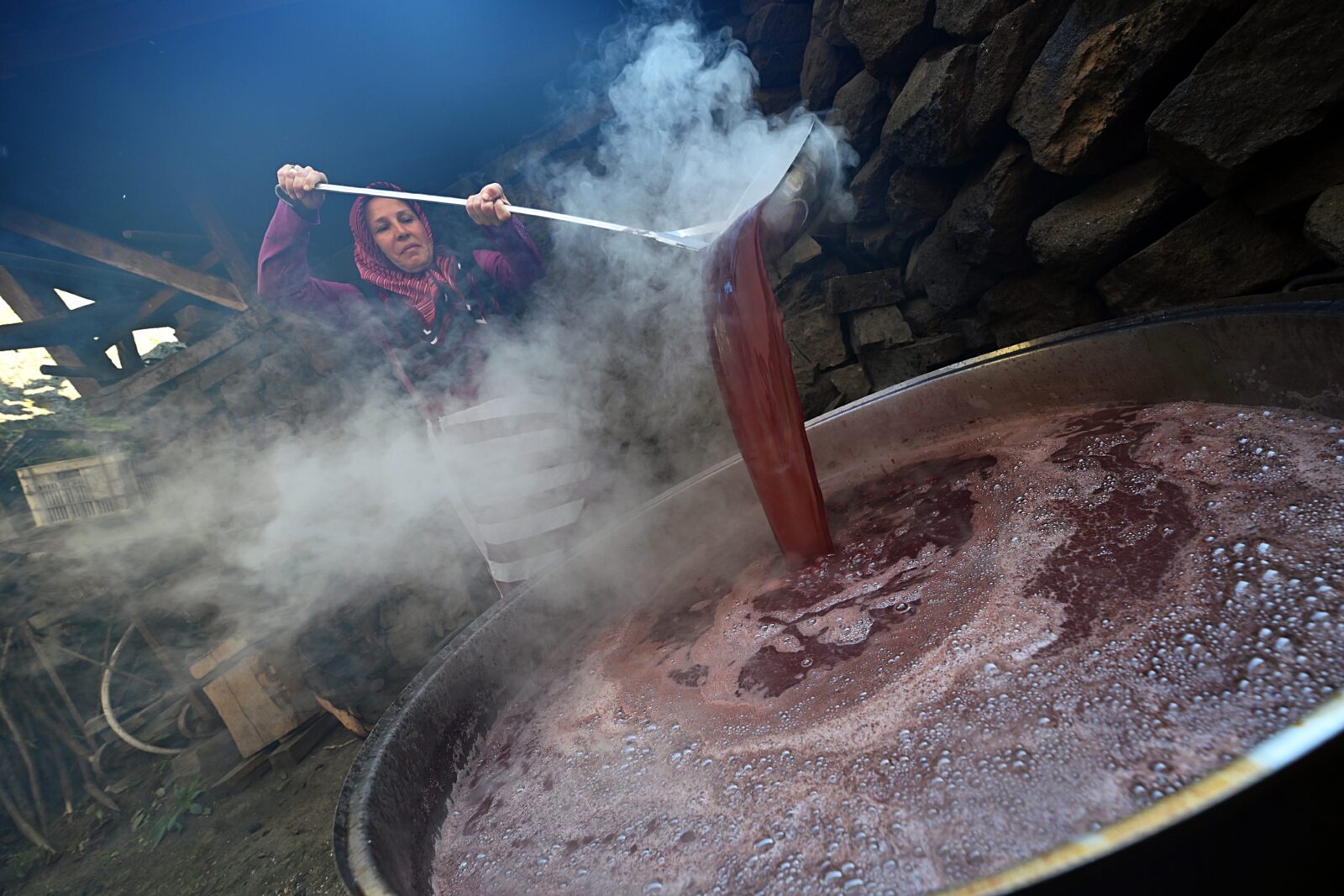 Fatma Koseli produces natural and additive-free molasses, applying the lessons she learned in Japan, Akcabat district of Trabzon, Turkiye, Sept. 30, 2024. (AA Photo)
