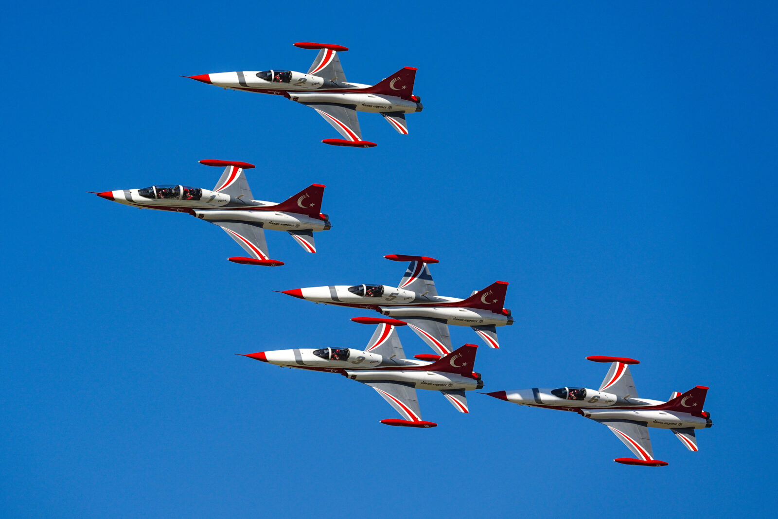 Turkish Stars, the aerobatic demonstration team of the Turkish Air Forces, performs a demonstration flight during Turkiye's premier technology and aerospace event, TEKNOFEST, on its third day at Adana Airport in Adana, Turkiye on October 4, 2024. (AA Photo)