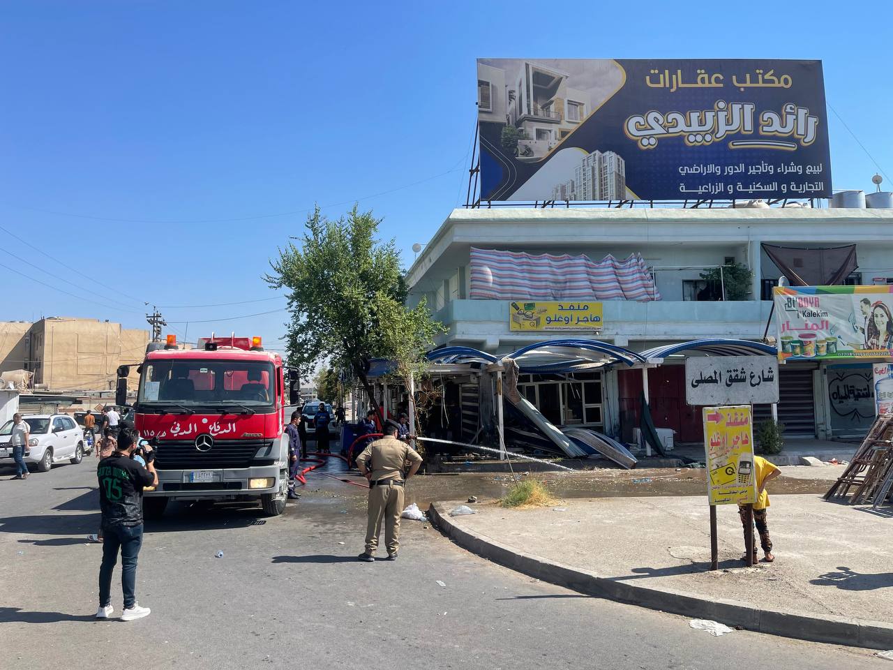 People inspect the area after a bomb attack targeted Saygin Haceroglu, the office manager of the Turkmen House affiliated with the Iraqi Turkmen Front, in the city of Kirkuk, Iraq on October 5, 2024 (Ali Makram Ghareeb - Anadolu Agency)