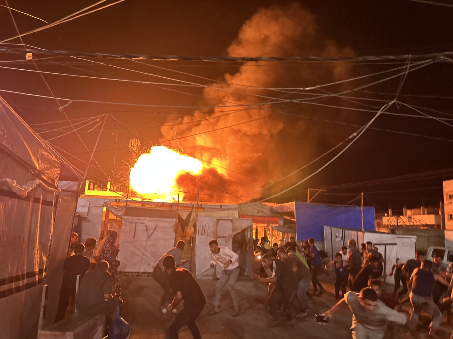Displaced Palestinians 'burned alive' by Israeli airstrike on tent encampment