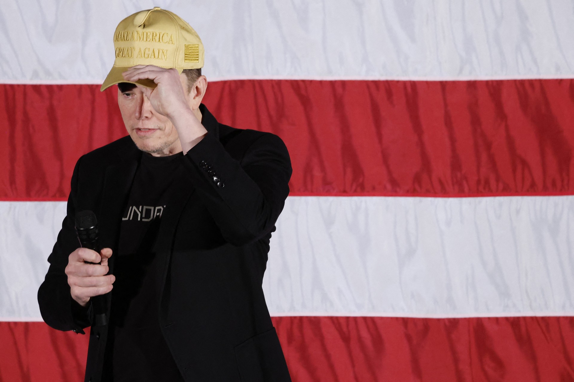Musk faces scrutiny over alleged Kremlin contact, voter giveaway controversy