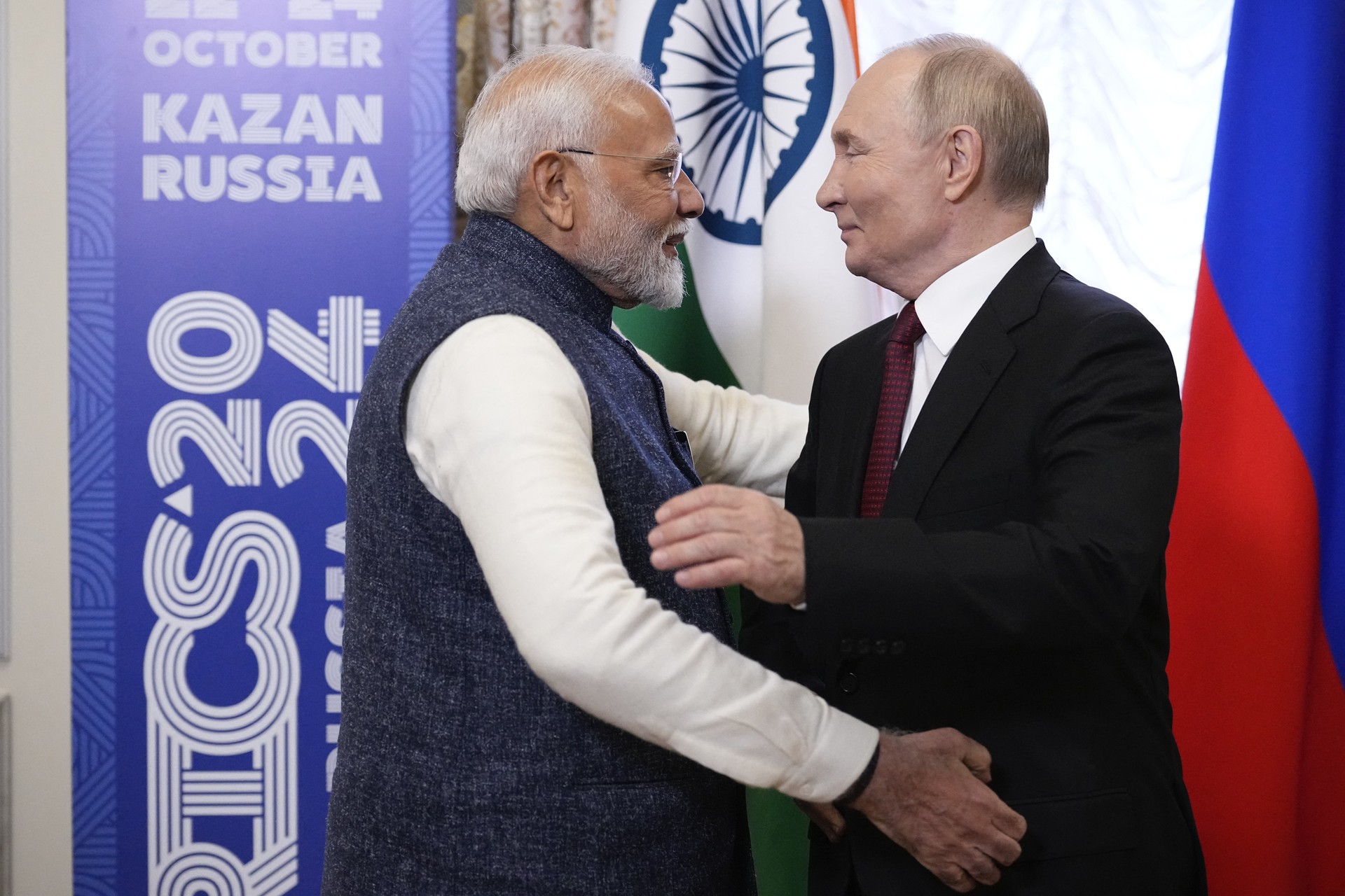 Russia's President Vladimir Putin meets with Indian Prime Minister Narendra Modi on the sidelines of the BRICS summit in Kazan on October 22, 2024. (Photo by Alexander Zemlianichenko / POOL / AFP)