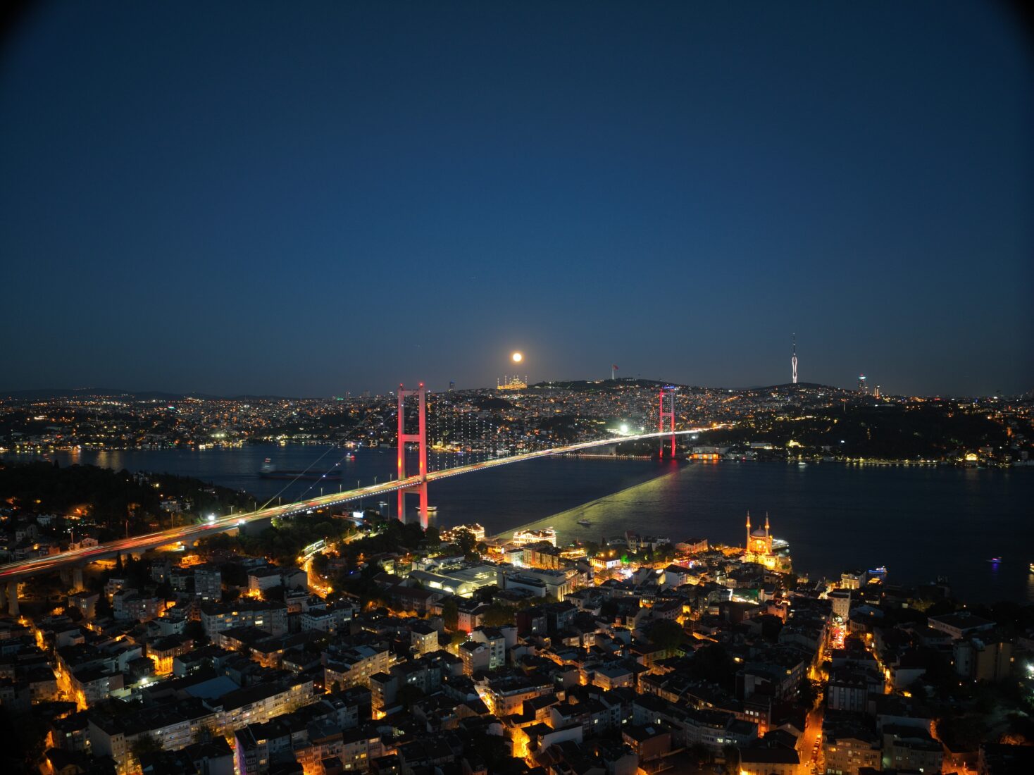 The postcard view of the full moon in Istanbul was captured from the air, Türkiye, 2024. (IHA Photo)