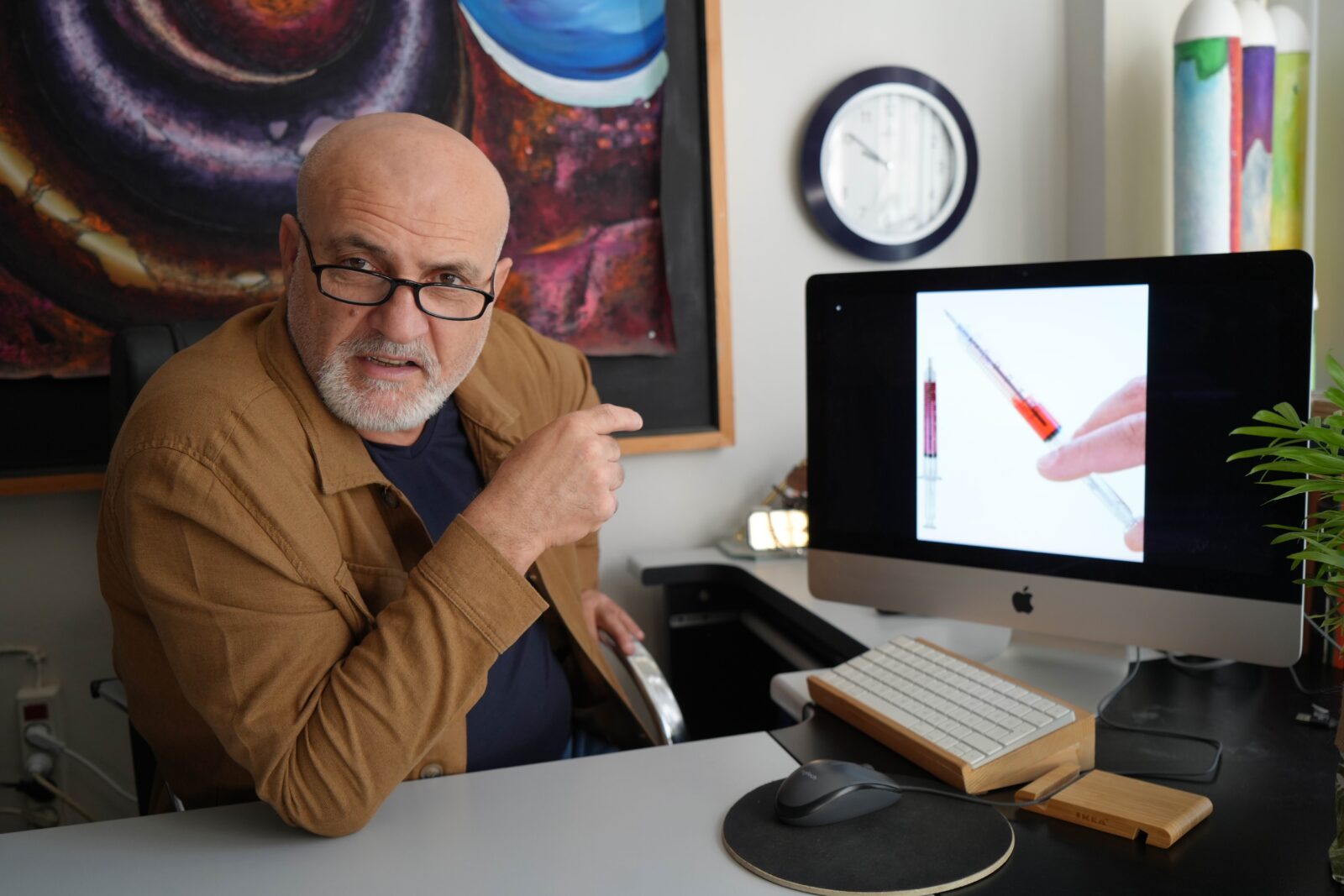 Professor Metin Eker, who has been conducting research on subconscious thoughts and codes for years, explains that subconscious coding, which begins with toys and cartoons from infancy, becomes ingrained in the mind during adolescence through imagery and visual culture, Türkiye, October 12, 2024. (IHA Photo)
