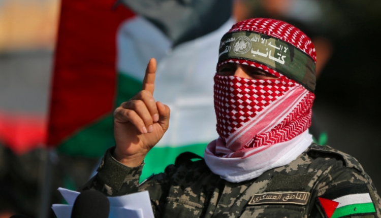 Abu Obeida, spokesman for the Izz al-Din al-Qassam Brigades, the armed wing of Hamas, speaking at a military show in the southern Gaza Strip 11 November 2019 (Reuters Photo)An Israeli tank maneuvers, amid the ongoing conflict between Israel and the Palestinian Islamist group Hamas, near the Israel-Gaza Border, in southern Israel, May 7, 2024. (Reuters Photo)