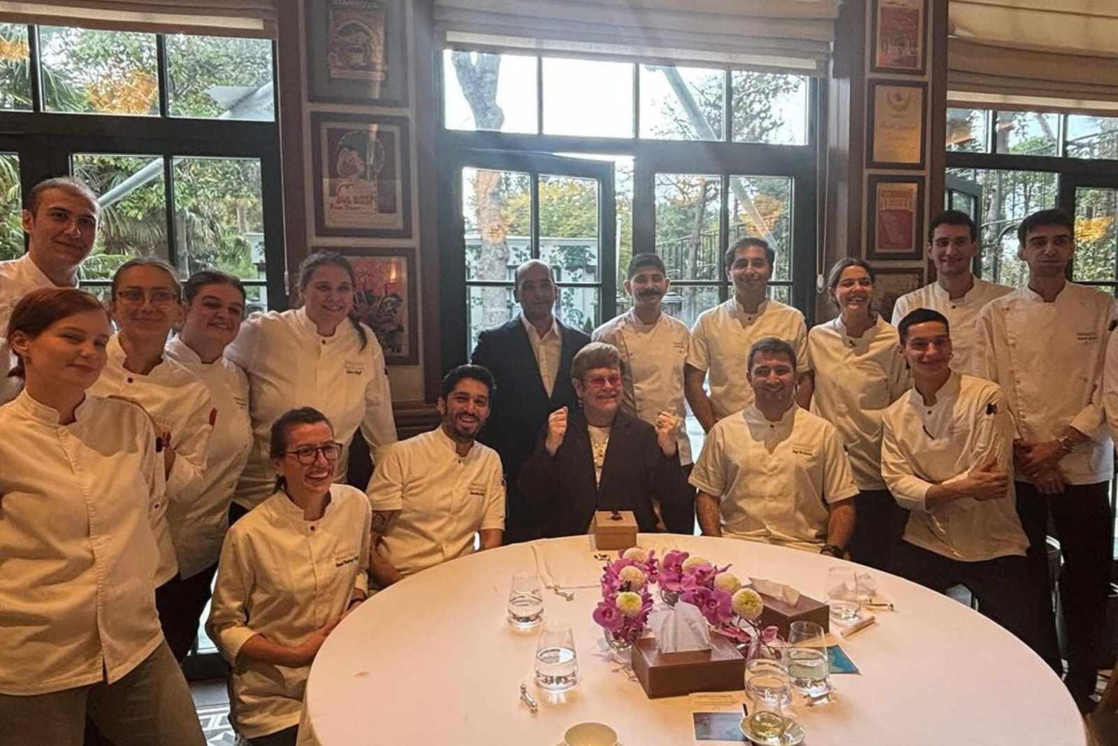 Sir Elton John poses with the kitchen staff of Telezzuz after enjoying a plant-based meal in Istanbul, Türkiye, Oct. 17, 2024. (Photo via Instagram / @telezzuz.ist)