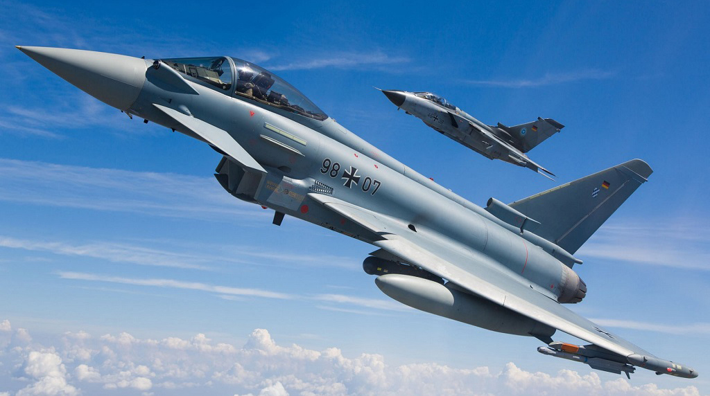 File photo of a German Eurofighter (front) and a Tornado during a formation flight. (Photo: Airbus)