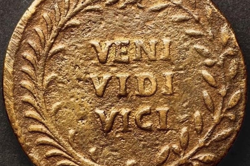Ancient coin with Julius Caesar's famous “Veni, vidi, vici.” (Photo via Wikimedia)