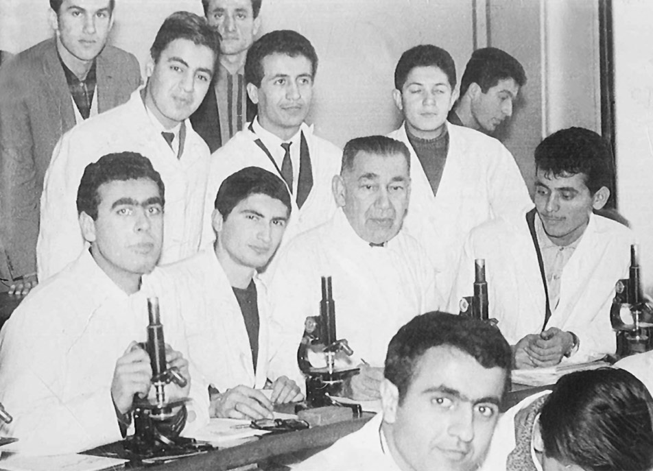 Aziz Sancar (second row, second from left) is seen next to his histology professor at the Istanbul Medical Center in 1965, Türkiye. (Photo via University of Texas at Dallas)
