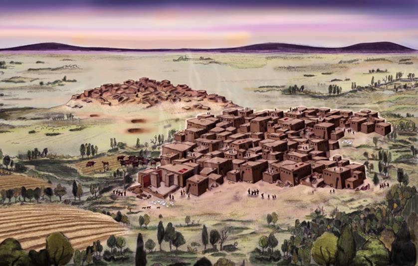 View of the west mound with the decaying east mound in the background. (Photo via Catalhoyuk Research Project)