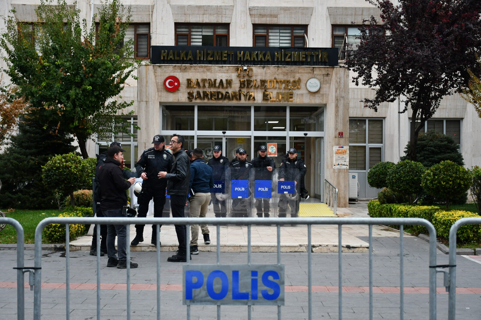 Turkish Parliament erupts as government and opposition clash over trustees