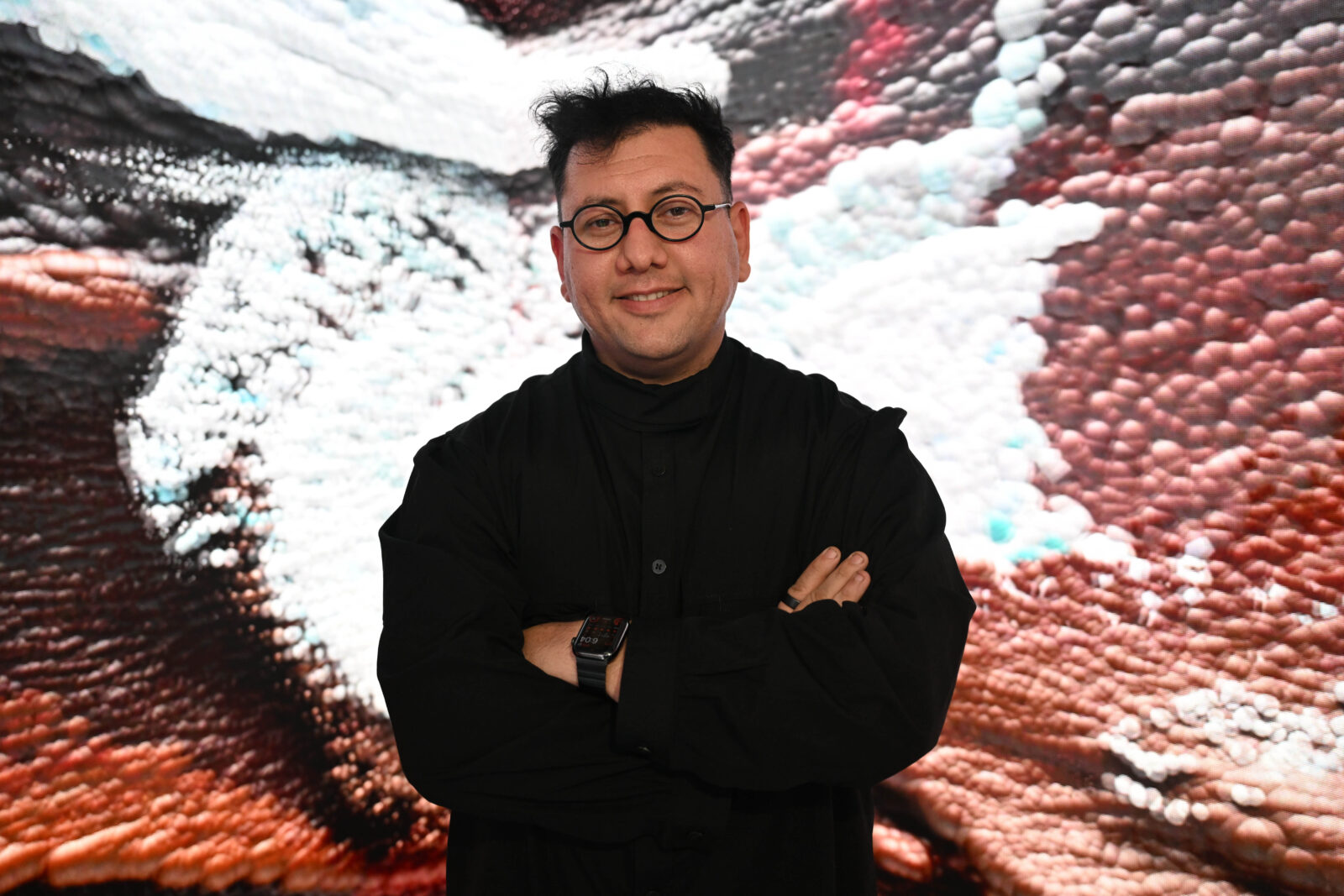 Turkish new media artist Refik Anadol poses during the launch of Inner Portrait, Turkish Airlines' art project, at Ataturk Cultural Center in Istanbul, Türkiye, on Nov. 27, 2024. (AA Photo)