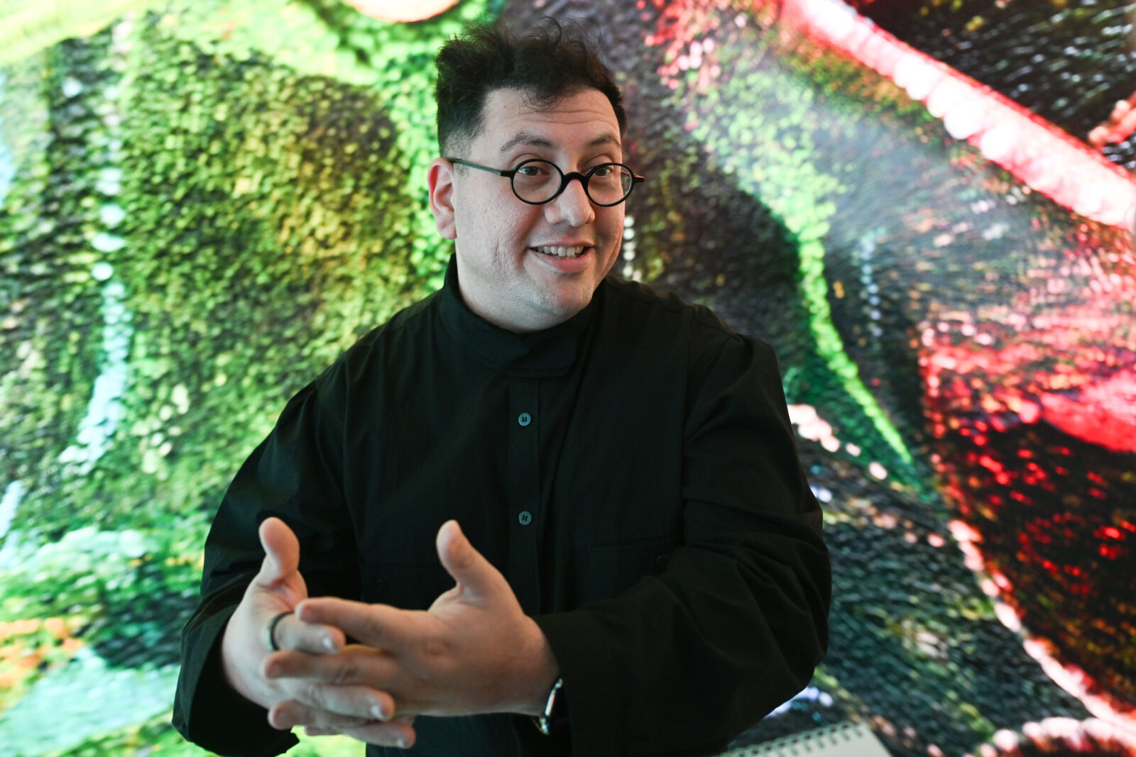 Turkish new media artist Refik Anadol speaks during the launch and Turkish new media artist Refik Anadol speaks during the launch of Inner Portrait, Turkish Airlines' art project, at Ataturk Cultural Center in Istanbul, Türkiye, on Nov. 27, 2024. (AA Photo)