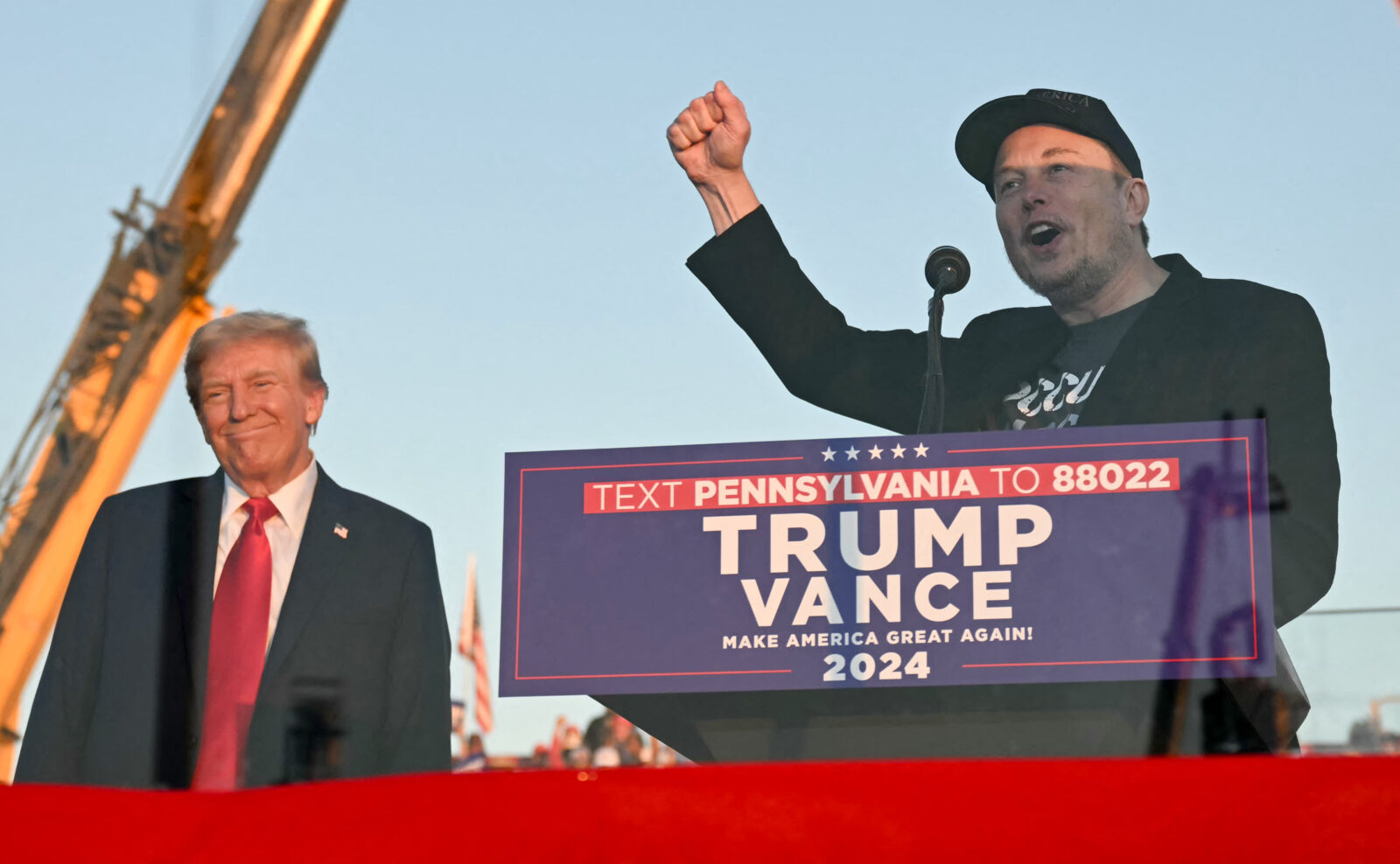 Tesla CEO Elon Musk (R) speaks on stage as he joins former U.S. President-elect Trump during a campaign rally at the site of his first assassination attempt in Butler, Pennsylvania, U.S. Oct. 5, 2024. (AFP Photo)