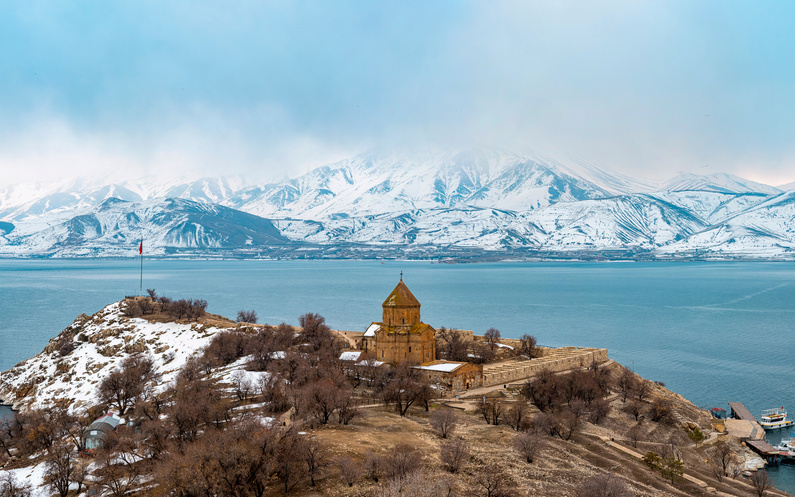 Akdamar Island in Van Lake, view of the Armenian Cathedral Church of the Holy Cross, Türkiye. (Adobe Stock Photo)