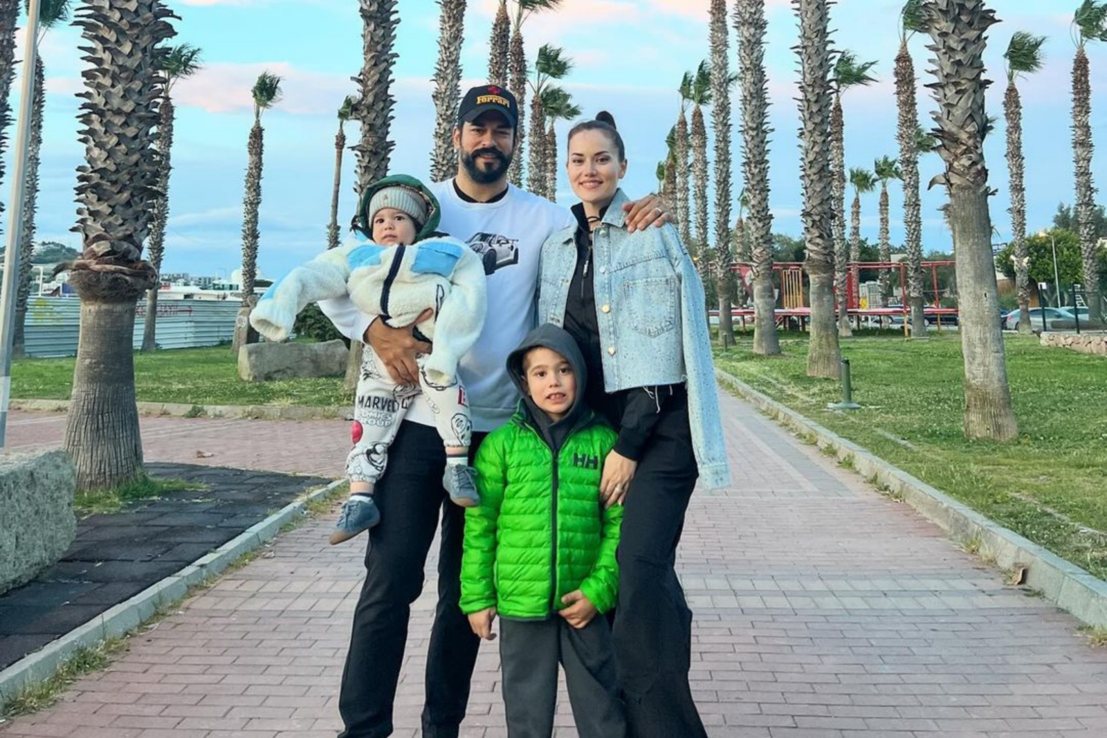 Burak Ozcivit, Fahriye Evcen and their kids pose during a family day out, April 9, 2024. (Photo via Instagram / @burakozcivit)